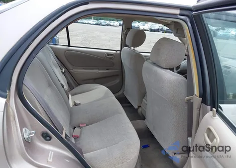 2001 Toyota Corolla Le from USA, damaged, VIN 2T1BR12E01C399979